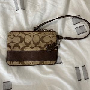 Coach wristlet in brown logo print